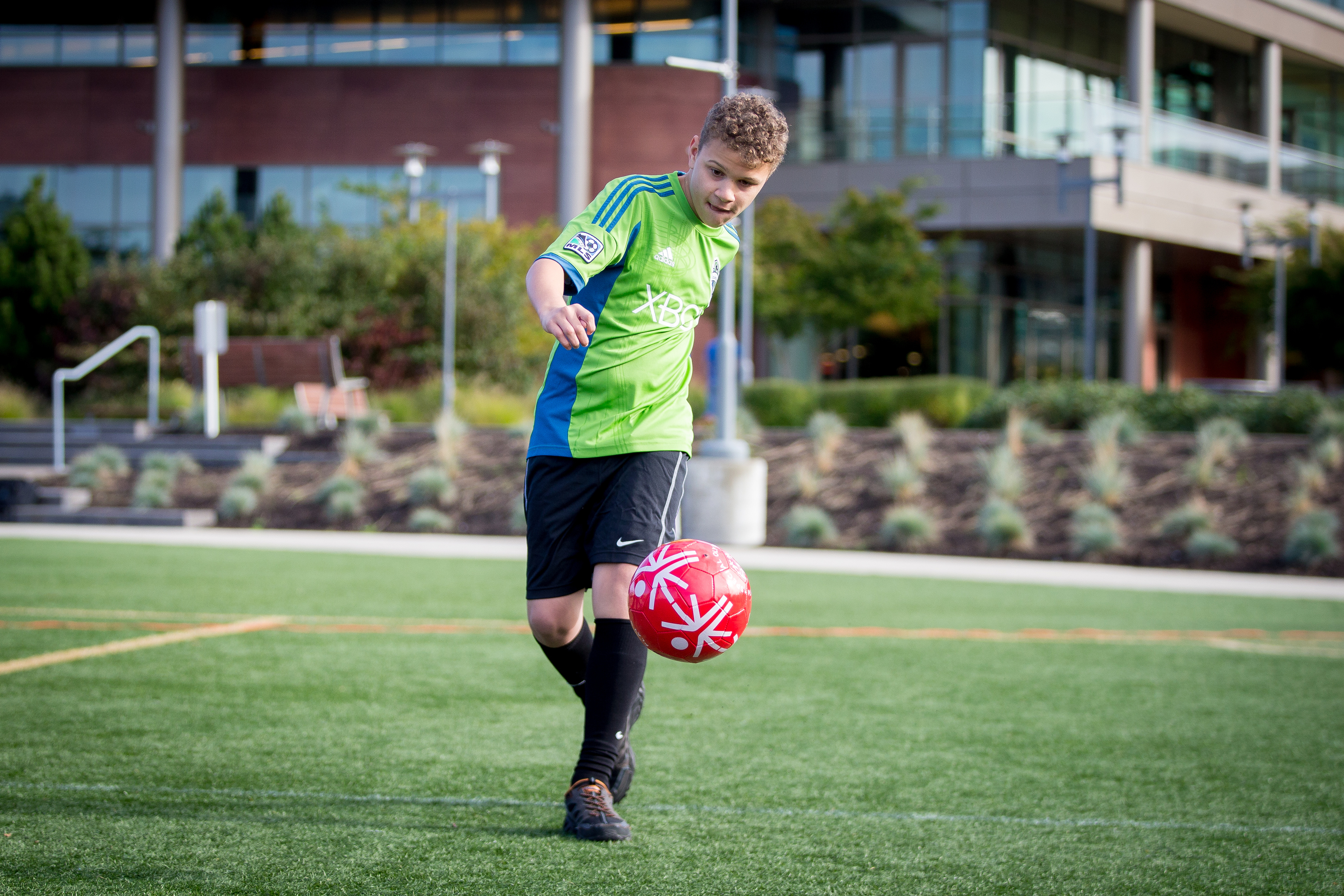 Ty Youmans warms up with the Special Olympics Play Unified athletes before Monday’s game. 