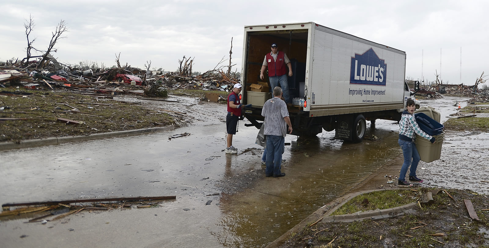 In the aftermath of a tornado, Lowe’s trucks provide much needed supplies to rebuild communities. (Source: Lowe’s)