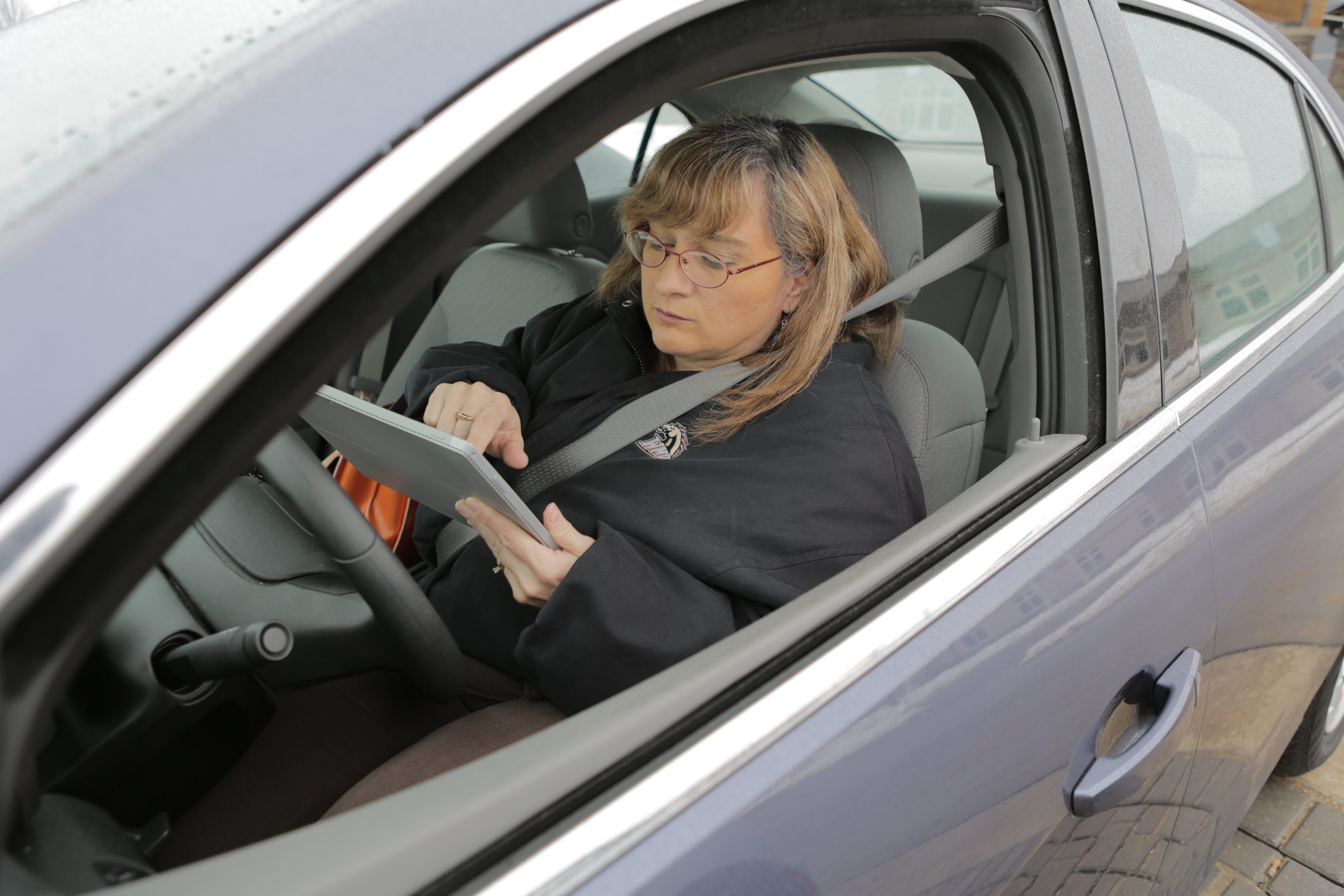 Melody Pillow, a medical social worker for Pokagon Health Services, uses her tablet to access information while in the field.