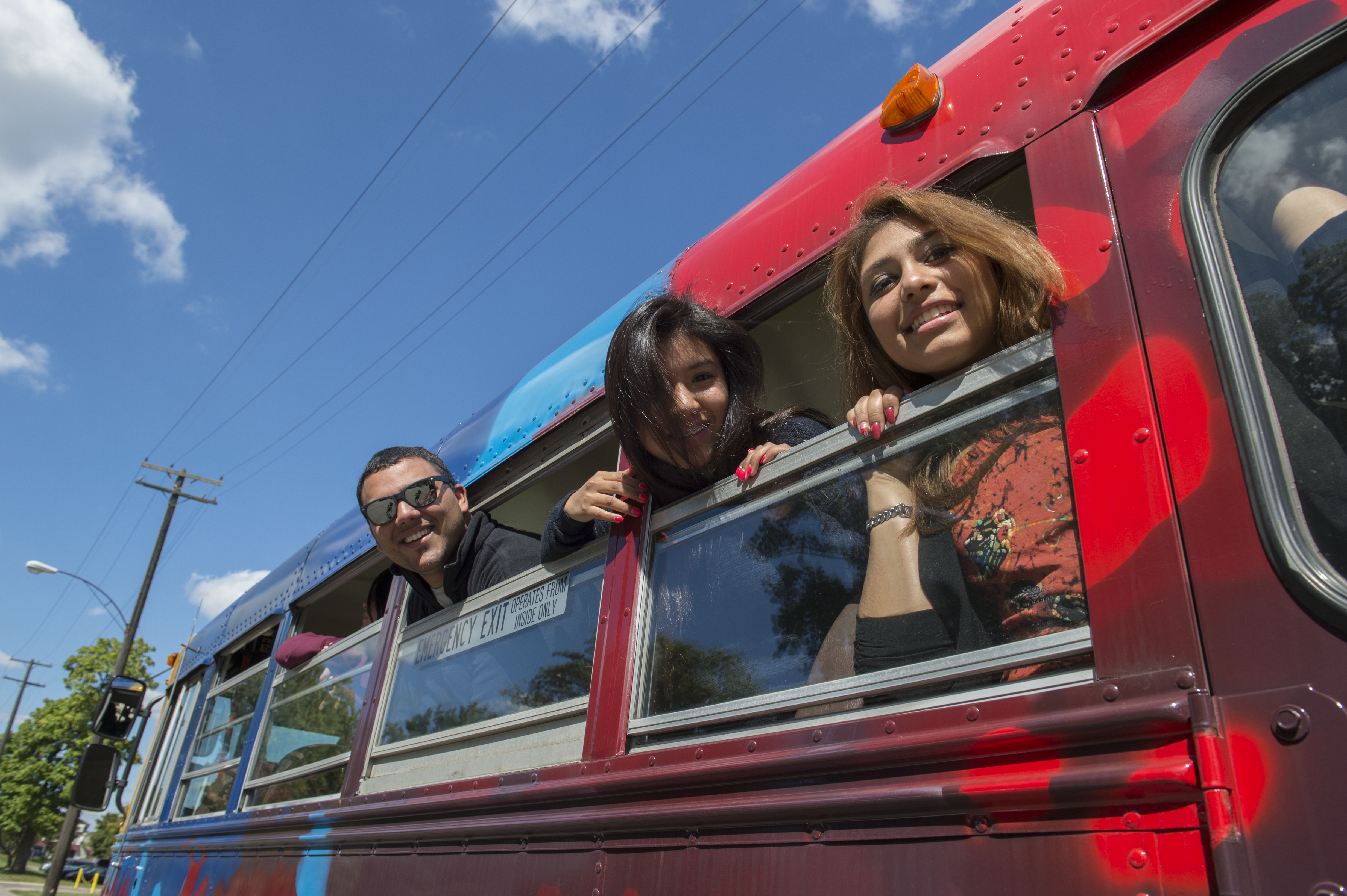 The Detroit Bus Company transports youths in a vibrant, refurbished school bus to after-school activities. Photo: Ami Vitale.