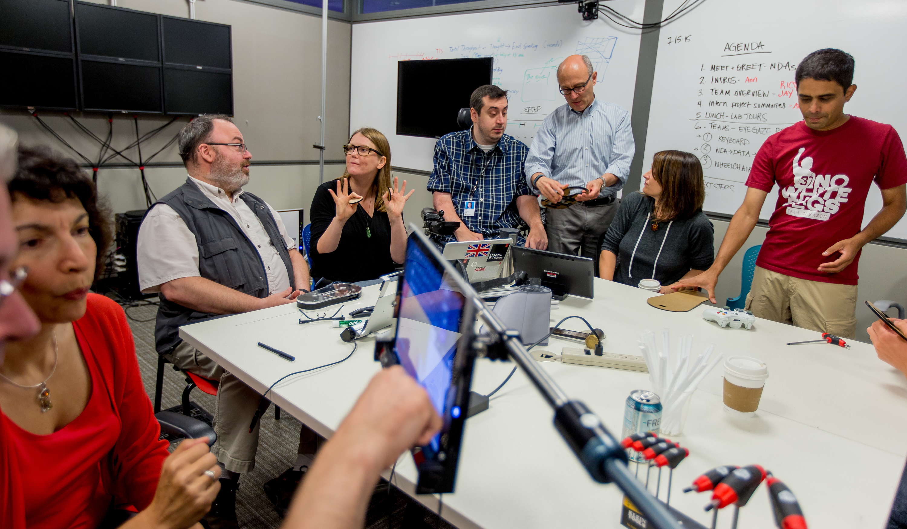 The Microsoft Research Enable Team discuss accessibility technology in their lab. (Photo by Scott Eklund/Red Box Pictures)