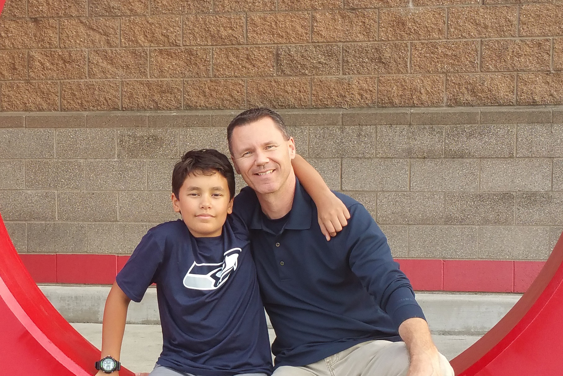 Andy Stephens with his son, Andrew, who has attended Microsoft YouthSpark Summer Camps two years in a row. “The curriculum is first-class,” Stephens says. Photo courtesy of Andy Stephens.