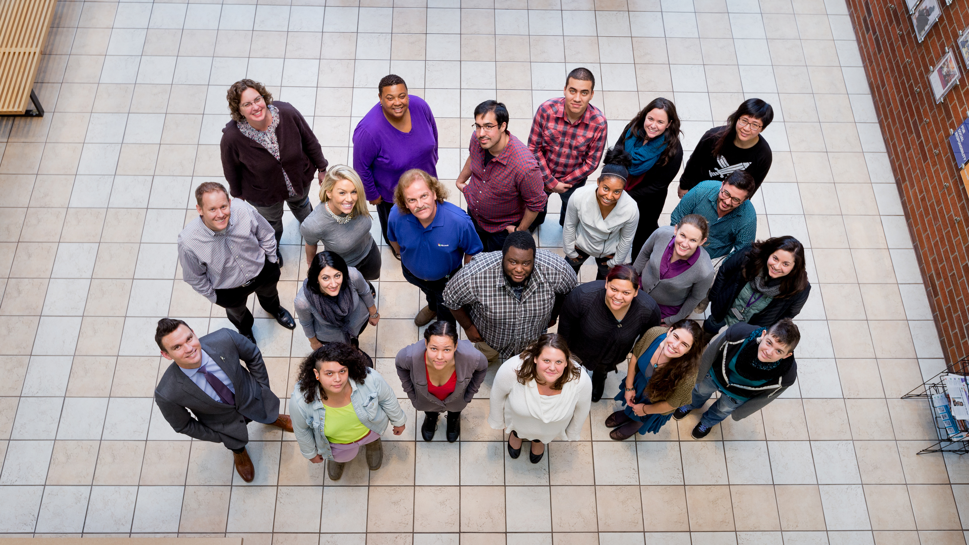 Microsoft Tech Talent for Good volunteers meet with Mockingbird Society staff at the nonprofit’s Seattle office. (Photography by Scott Eklund/Red Box Pictures)