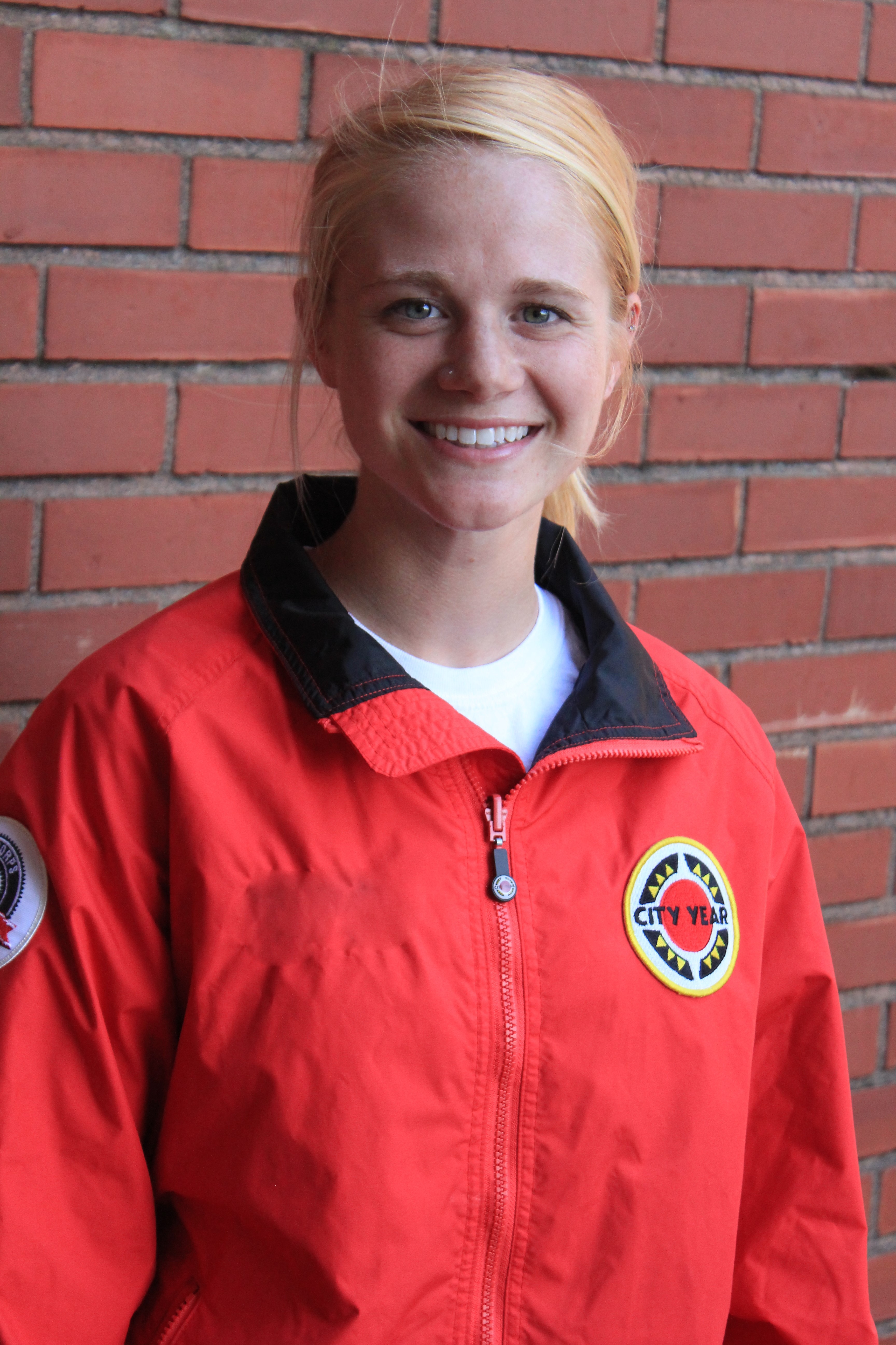 City Year AmeriCorps member Rose Carlson is serving as a mentor and math tutor to 6th-grade students at Aki Kurose Middle School in South Seattle. 