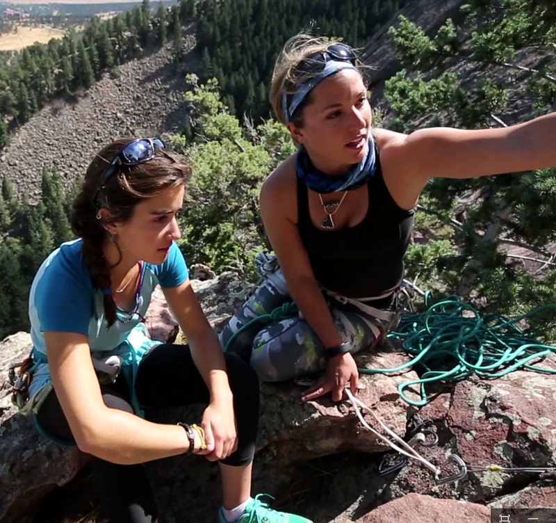 Melissa Arnot and Maddie Miller climbing on mountain