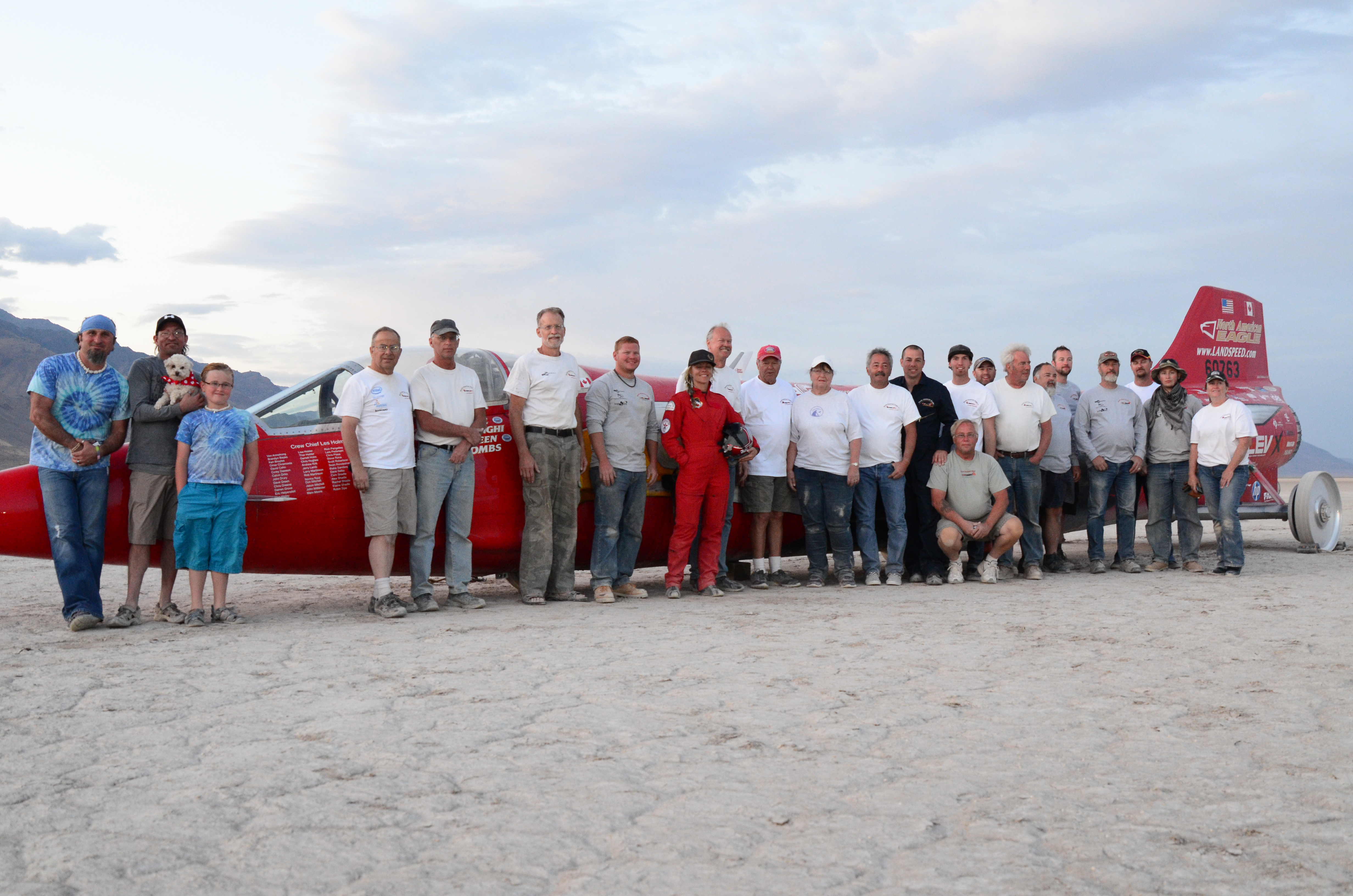 NAE crew stands in front of the North American Eagle