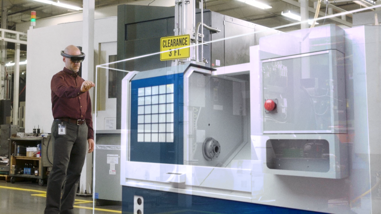 a man uses HoloLens technology to work