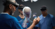 a doctor uses hololens to view a spine