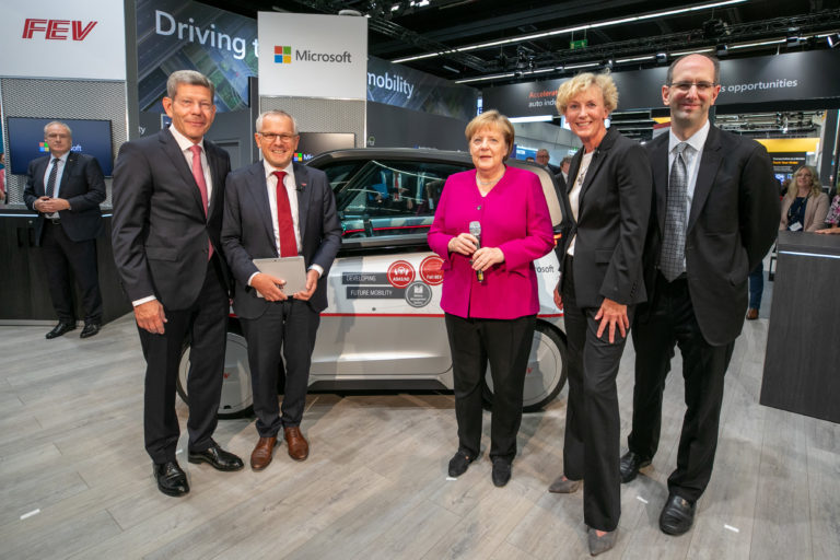 Angela Merkel and Scott Guthrie at FEV display in Microsoft Booth