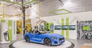 Blue convertible car on a raised platform