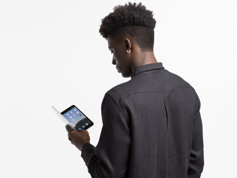 Man holding Surface Duo