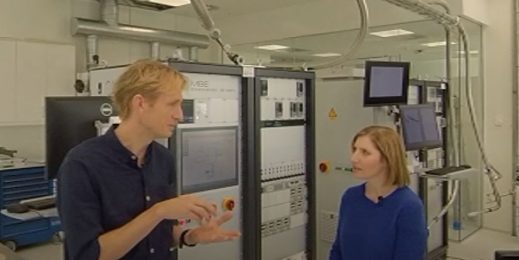 Man and woman talking in a lab setting