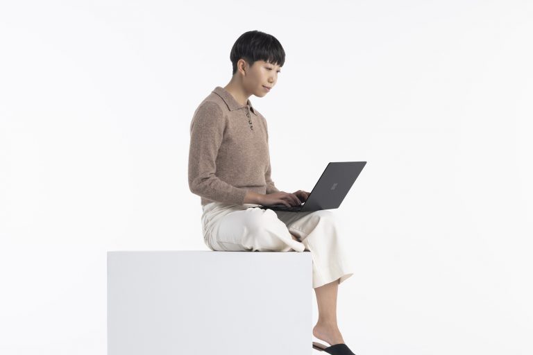 Woman using a Surface Laptop 4