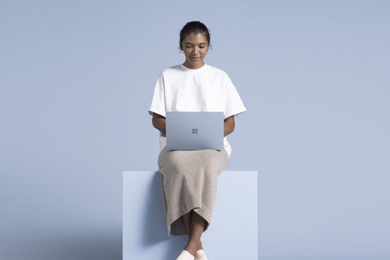 Woman using a Surface Laptop 4