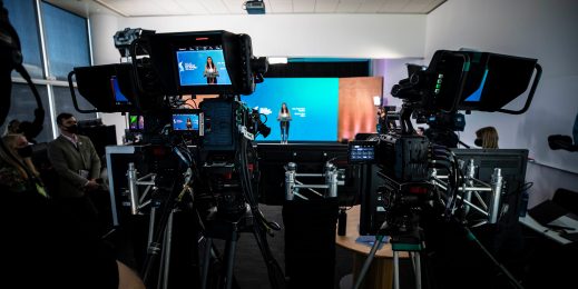 Cameras focused on a speaker in a room