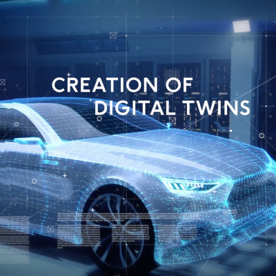 Person taking a photo of the front of an auto