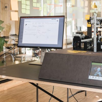 Monitor screen next to demo hardware setup