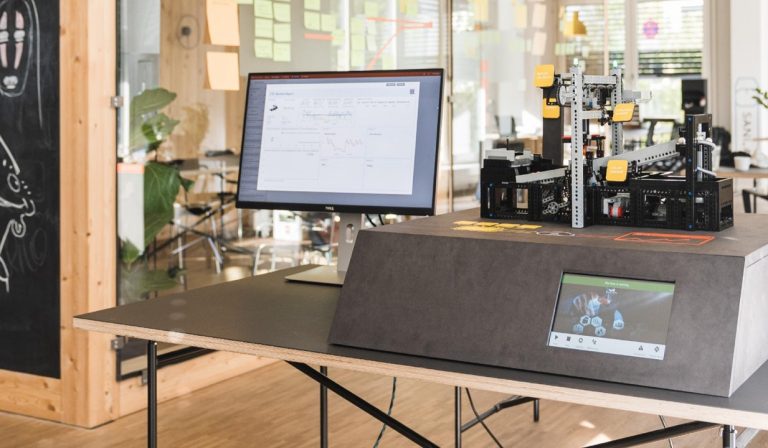 Monitor screen next to demo hardware setup