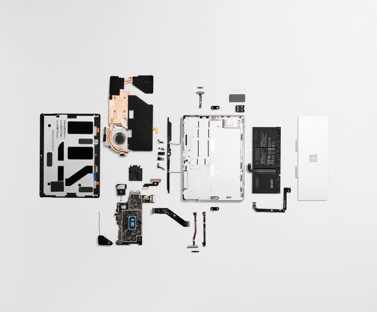 Surface Pro 8 components laid flat with interior components exposed