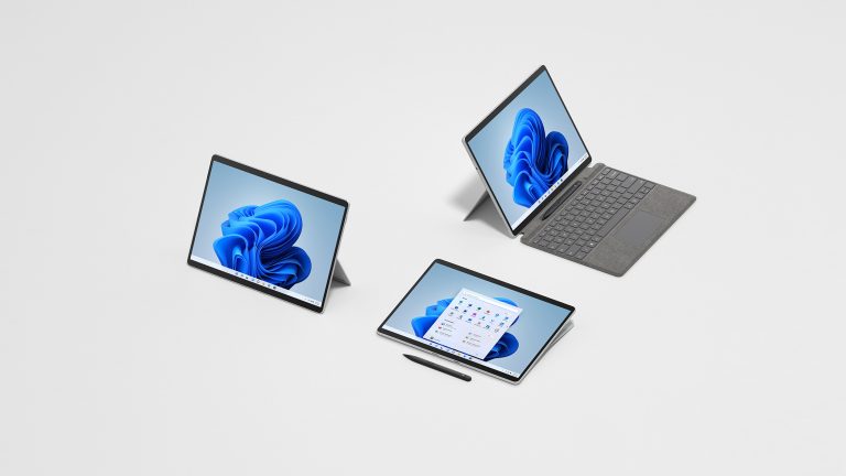 Three Surface Pro 8 devices