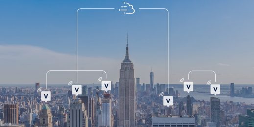 City skyscrapers connected by boxes labelled with the letter V and wifi symbol