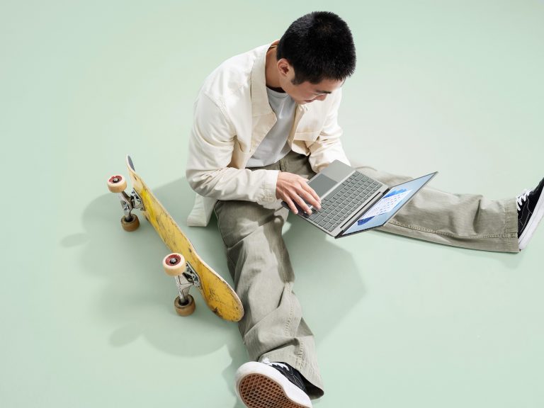 Man using Surface Laptop Go 2