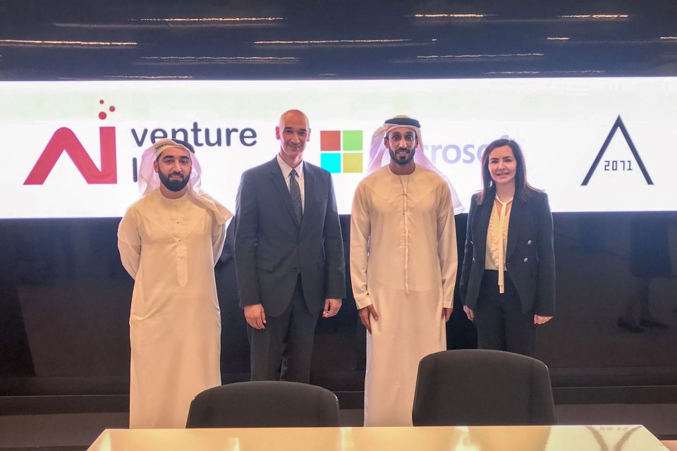 Group photo of key people from Microsoft, M12, and Dubai Future Foundation at the event site