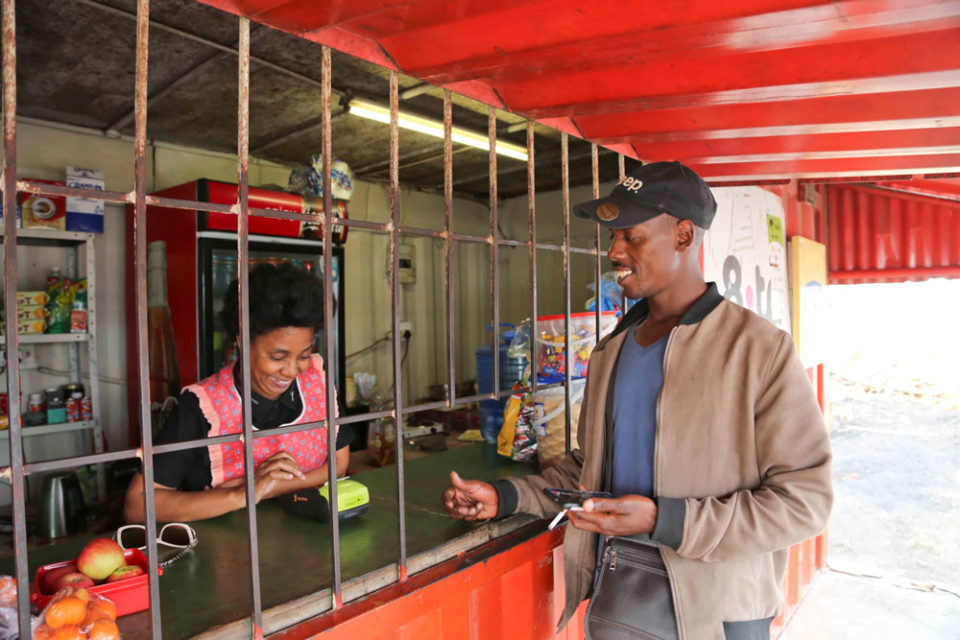 Man and a woman interacting during sales operation