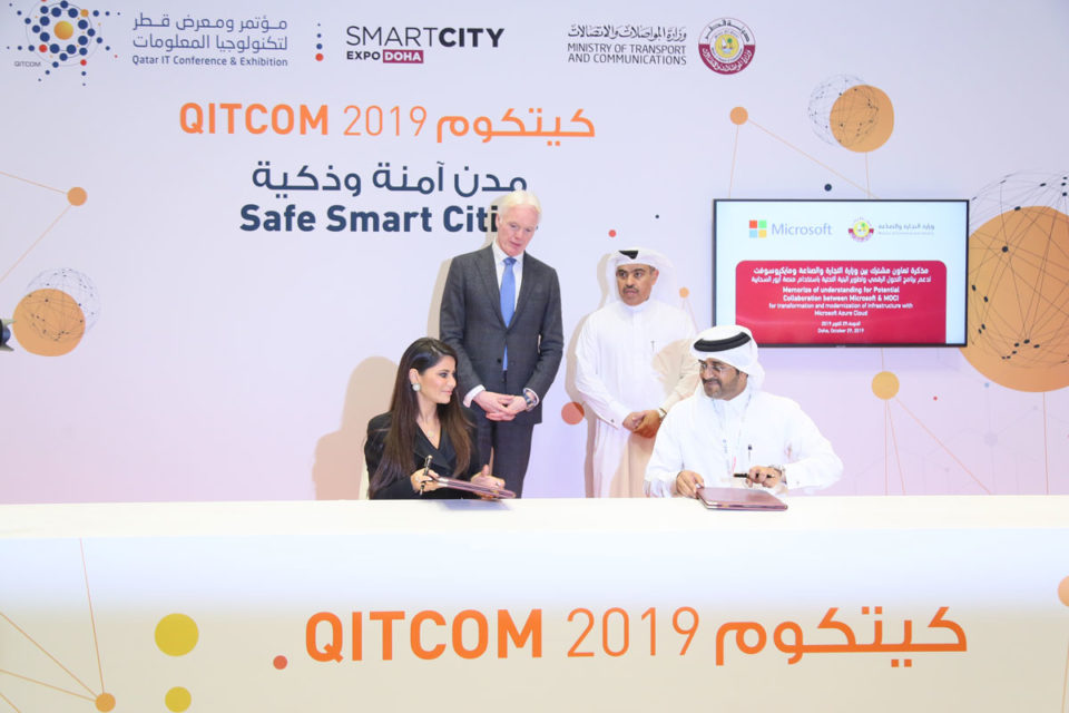 Spokespeople from Qatar Ministry of Commerce & Industry (MOCI) and Microsoft signing partnership during QITCOM 2019.