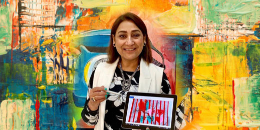 Dubai art teacher with Microsoft Surface Pro device