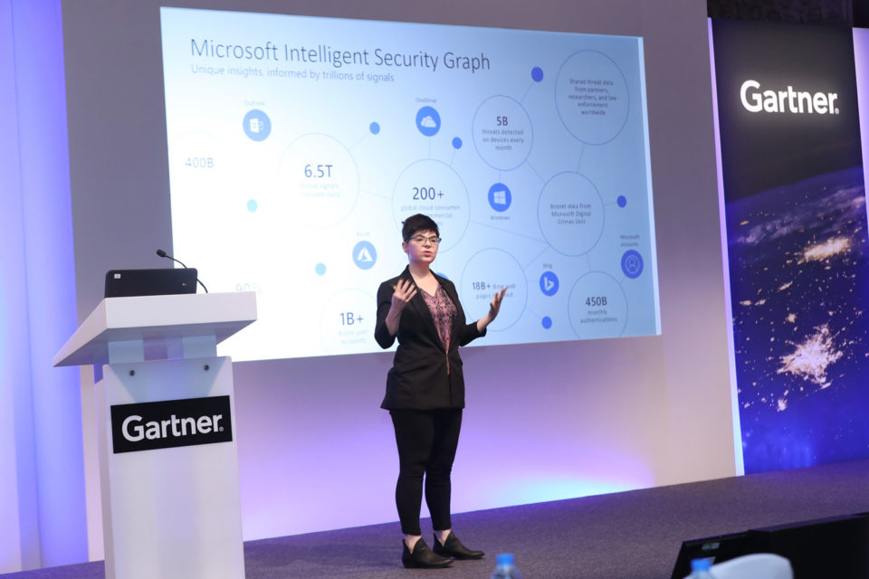 Picture of Microsoft spokesperson delivering a keynote speech.