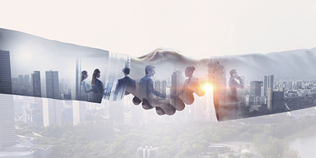 Taking hands in the name of partnership. 