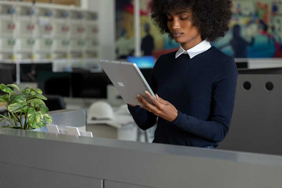 lady working on Surface device