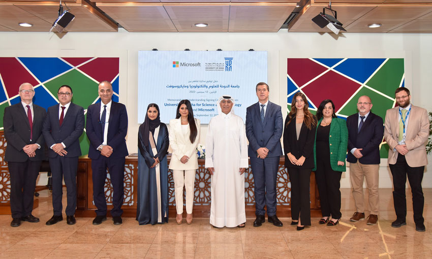 A group photo for UDST and Microsoft teams during the MoU signing ceremony.