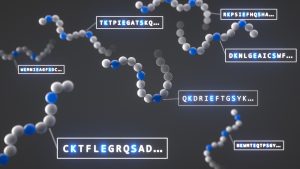 Blå, vita och grå biologiska krumelar på en mörkgrå bakgrund.