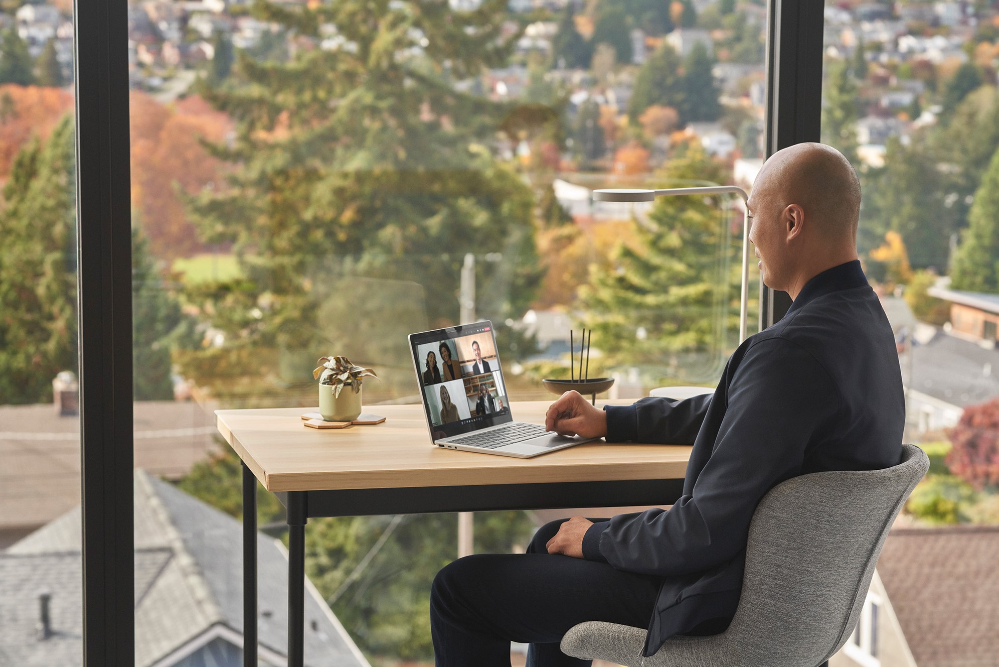 man video calling on laptop