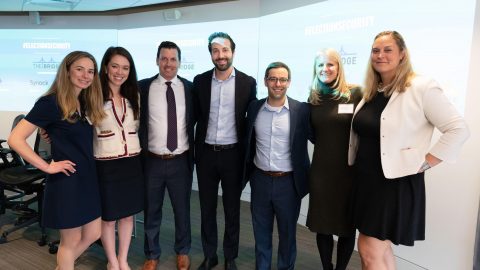 panelists pose for a picture