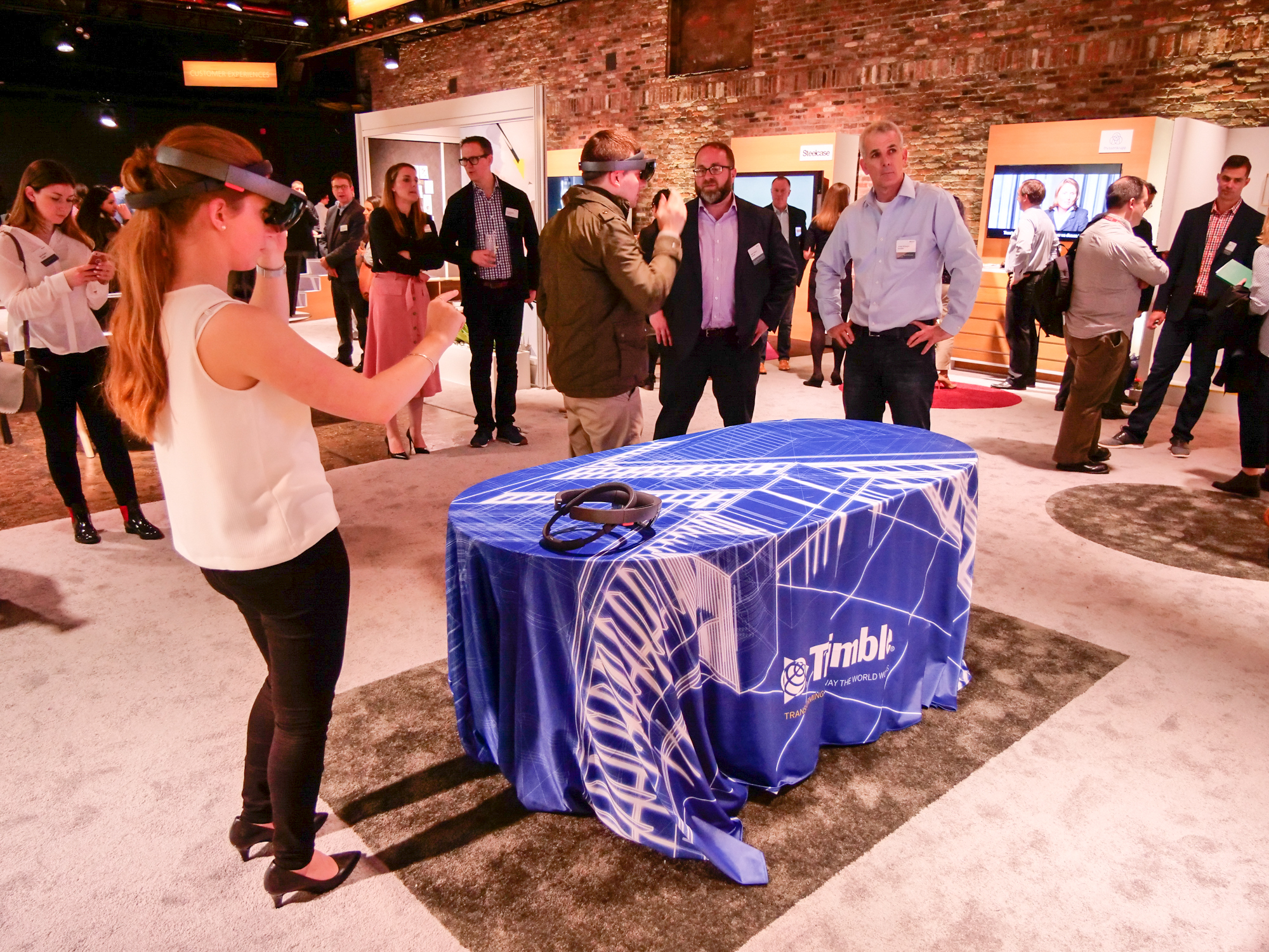 A female engineer wears a HoloLens device at a Microsoft event in New York City. 