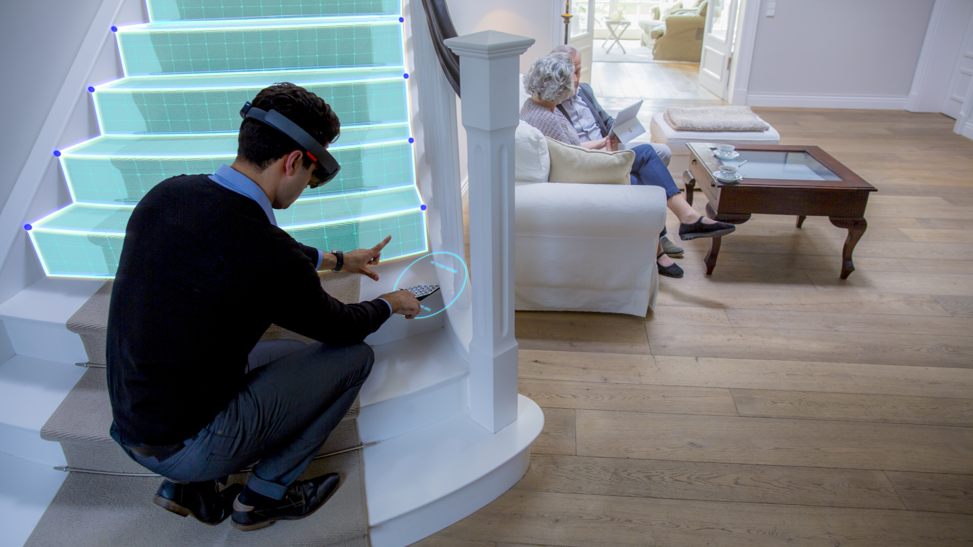 Man wears HoloLens headset while looking at holographic steps on a staircase