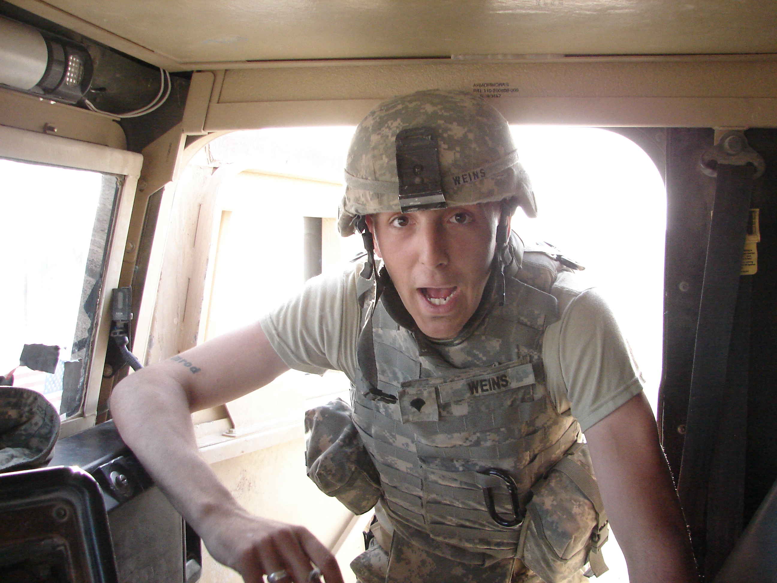 Jerry Weins in a truck in Iraq.