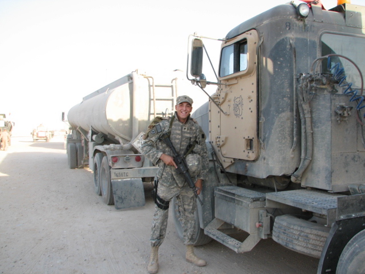 Andrew Weins with his fuel hauler in Iraq.