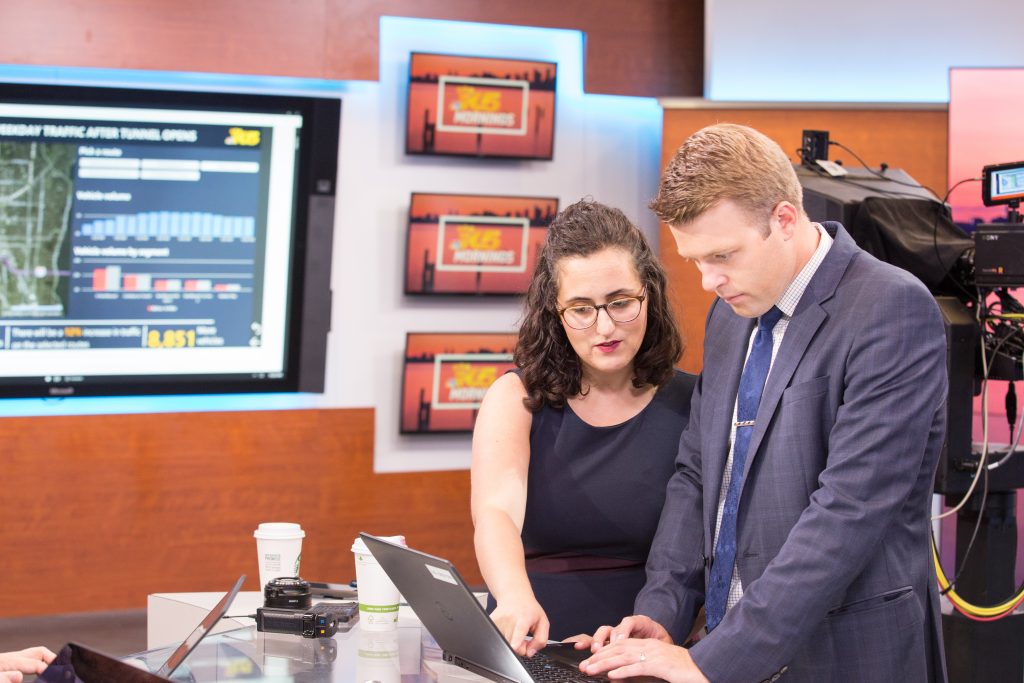 KING journalists Jake Whittenberg and Taylor Mirfendereski speak at the station.