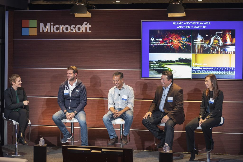At the Conversations in AI event, Microsoft CVP of Azure Julia White leads a panel discussion with (left to right) Tassilo Festetics, vice president, global solutions, Anheuser-Busch InBev; Abhishek Pani, senior director of AI product and data science, Adobe; Jack Brown, SVP of product and software, Arccos Golf; and Fiona Tan, SVP of customer technology, Walmart Labs.