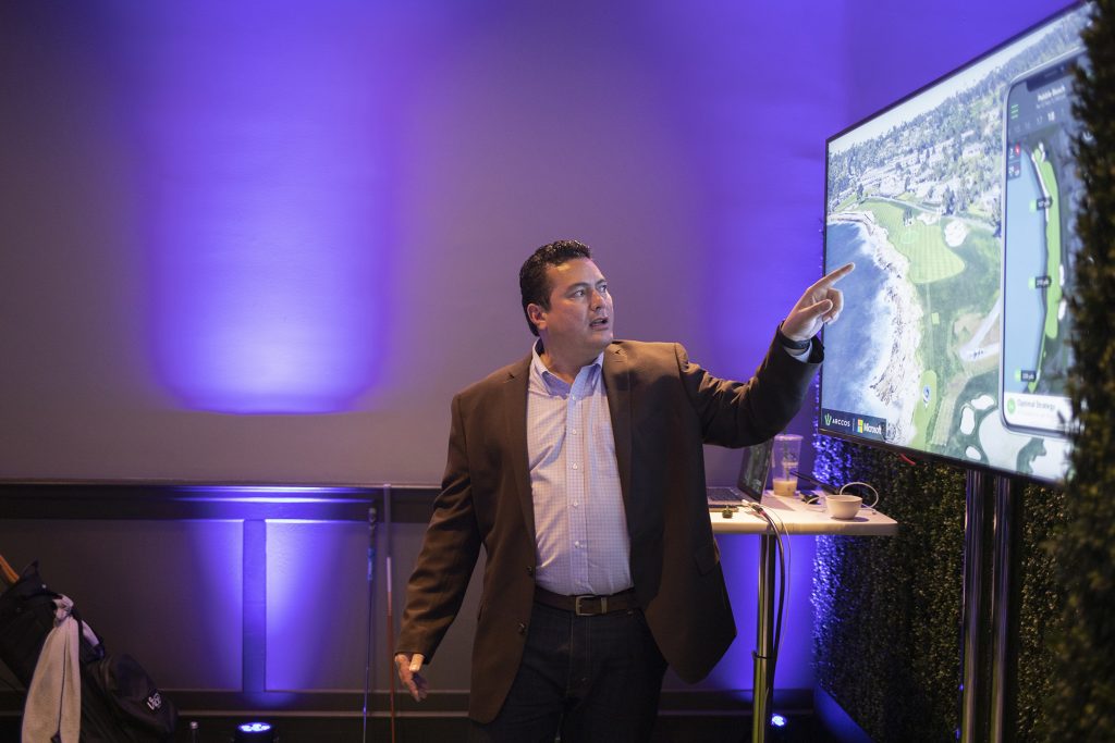 Jack Brown, SVP of Product and Software at Arccos, demonstrates Arccos Caddie at Conversations on AI, a Microsoft event in San Francisco.