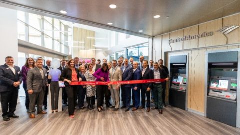 Judson Althoff poses with Bank of America employees at the opening of the new bank on Microsoft's Redmond, Washington campus.