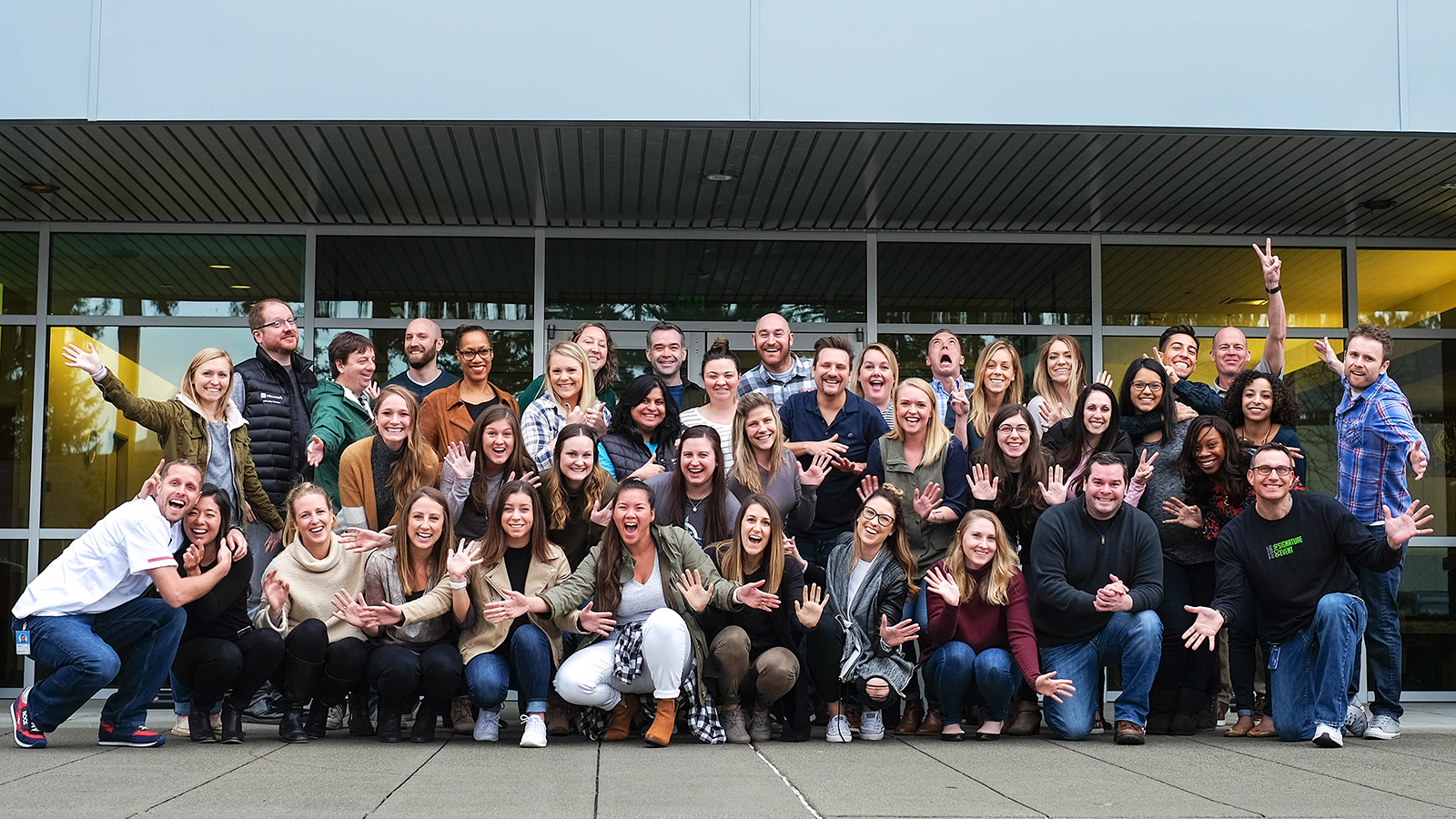 Microsoft recruiters stand outside of the Microsoft Global Talent Aquisition offices on the Redmond, WA, campus