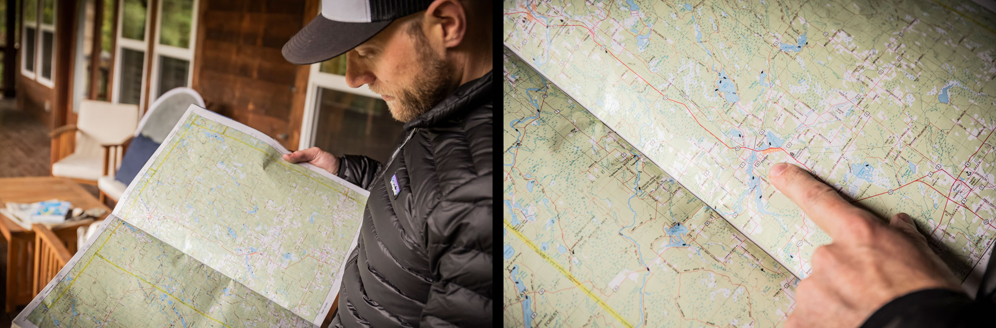 A man wearing a ball cap holds a map and points to Phillips, Wisconsin