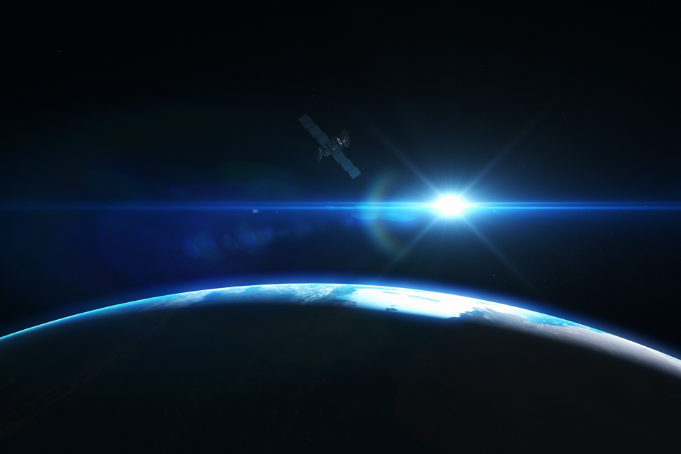 Satellit im Weltraum, darunter die Erde