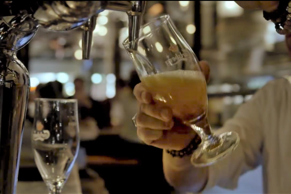 Pouring beer from a tap