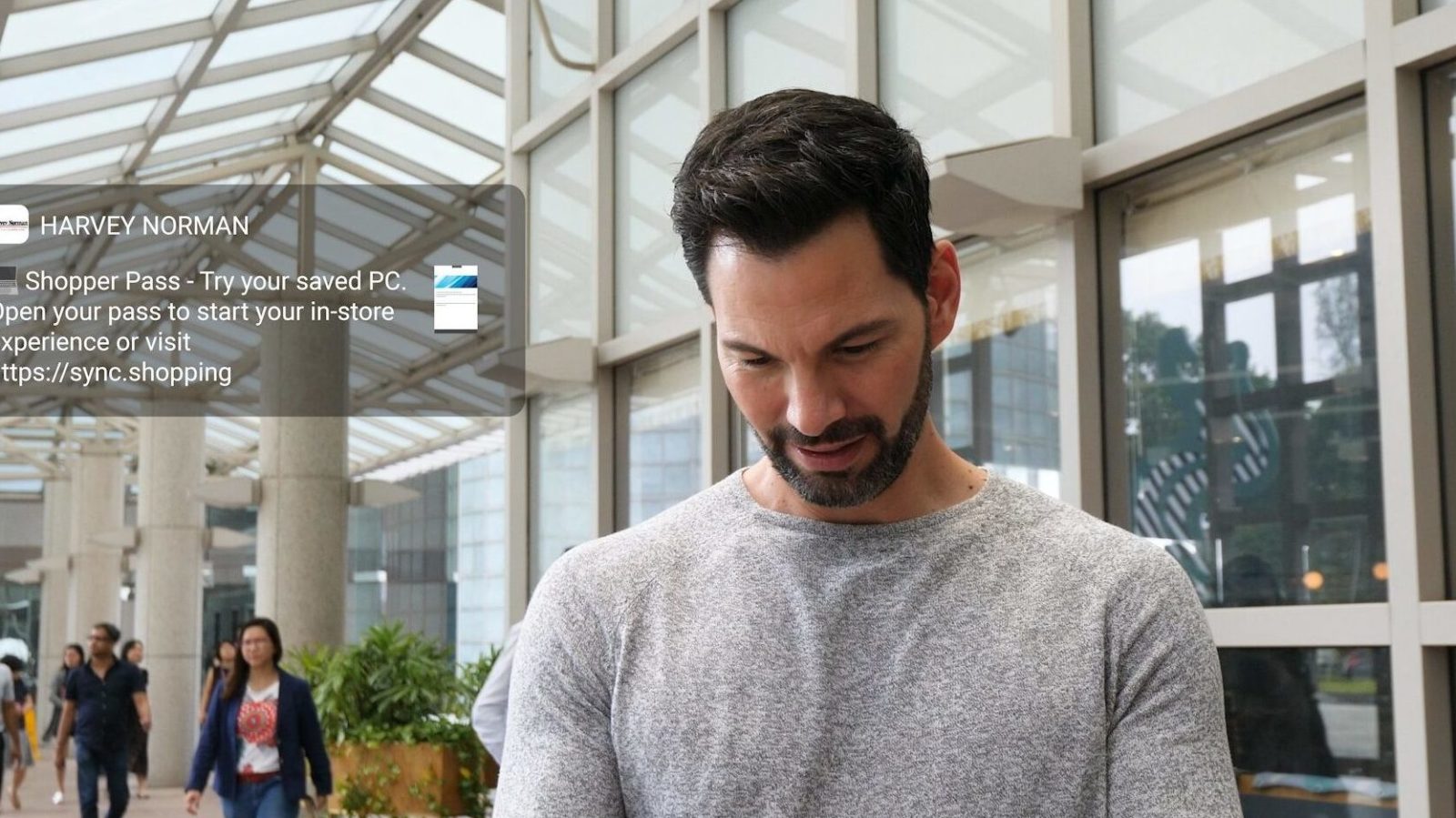 Social media influencer, Bobby Tonelli, tries out Microsoft Synchronized Shopping in Singapore.